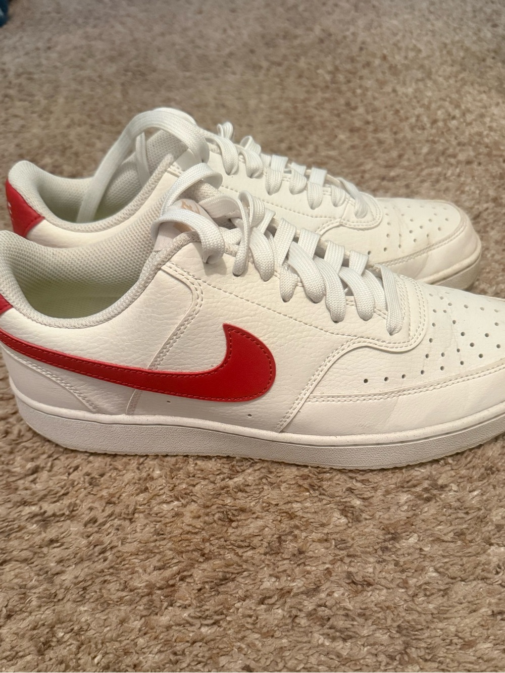 Nike women’s White Leather Sneakers with Red Swoosh